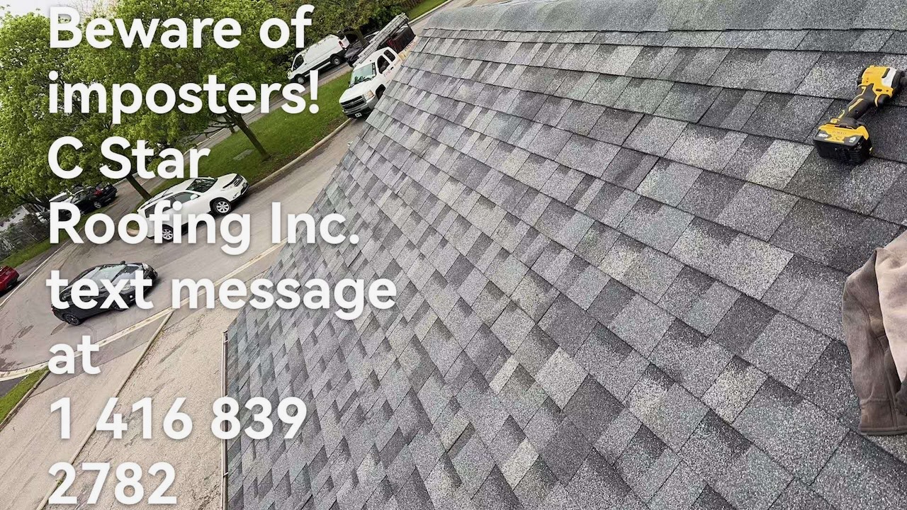 Close-up of newly installed grey architectural shingles