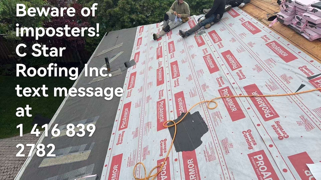 Roofers laying Owens Corning ProArmor synthetic underlayment on roof deck
